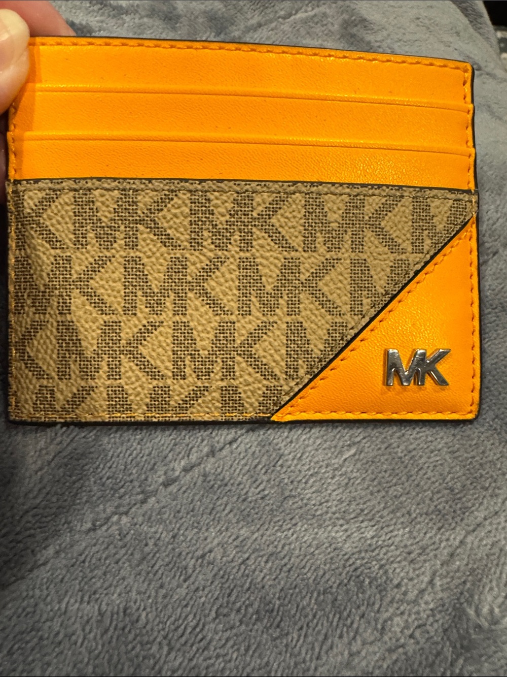 MK  CARD HOLDER
Brown, orange,  new 4x3 in.
